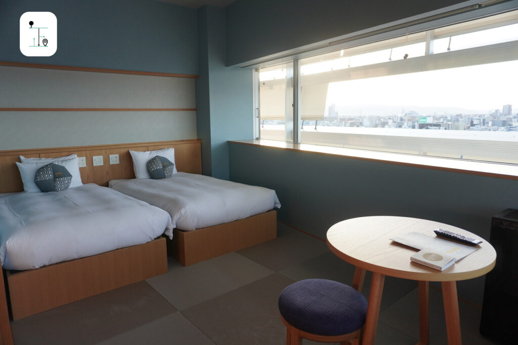 beds in the deluxe room of the OMO7 Osaka