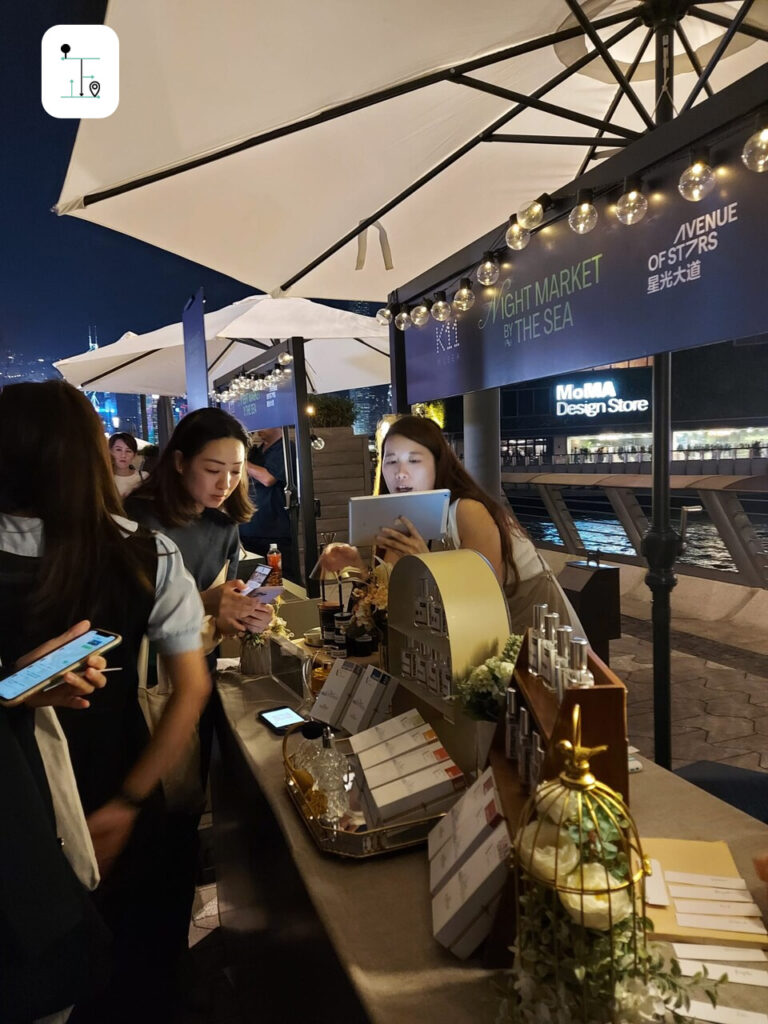 the owner of the Scentist Hong Kong selling the perfume to guests