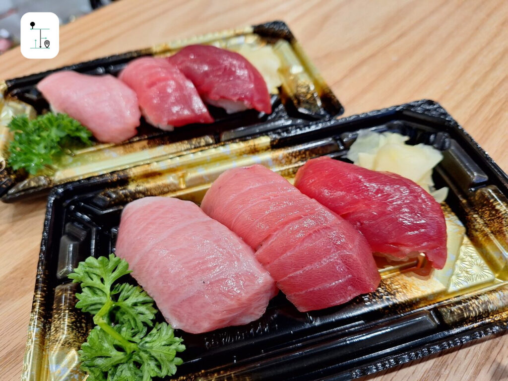 3 different pieces of tuna sushi.