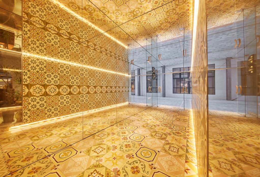 Nostalgia floor bricks with mirror corridor located in the entrance of the Timeless Boutique Hotel, Shanghai