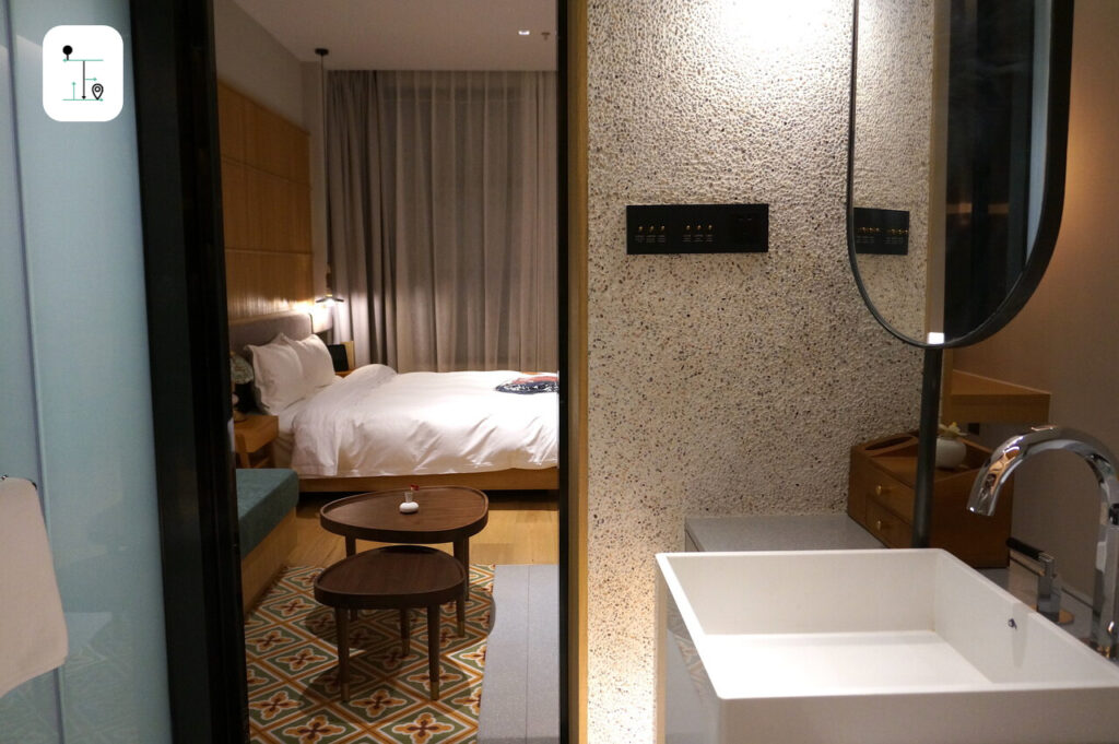 the slide door separating the bathroom and bedroom area in the deluxe room, the Timeless Boutique Hotel, Shanghai