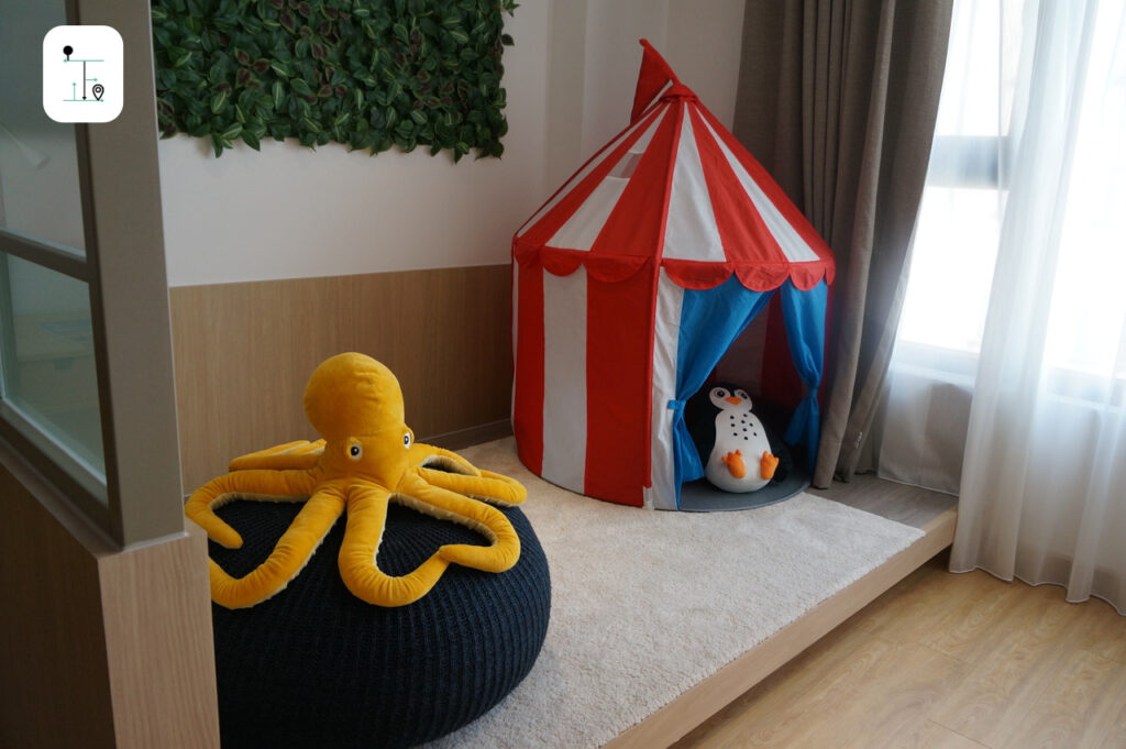 Little kid's corner with tent and cushion in the Shark themed room, the Fullon Poshtel Kuohsiung.