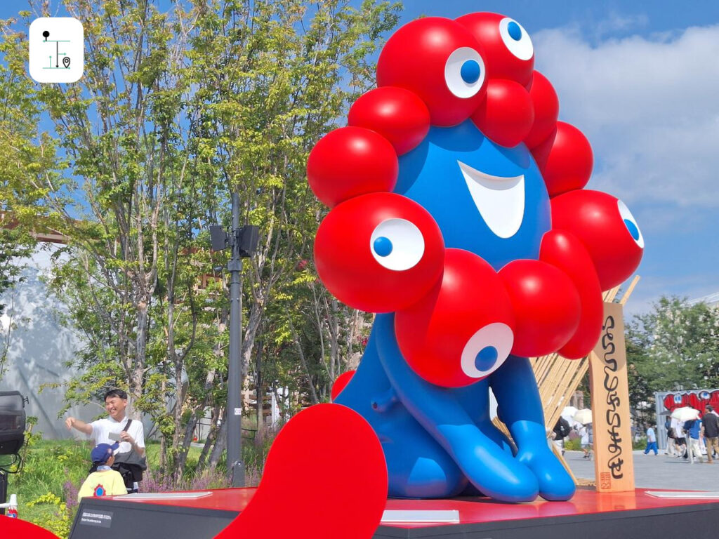 MYAKU-MYAKU is the mascot of the Osaka Expo 2025. He is in welcome pose to greet the guests.